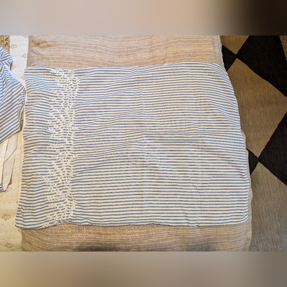 Pair of Nicole Miller embroidered seersucker cotton stripe shams